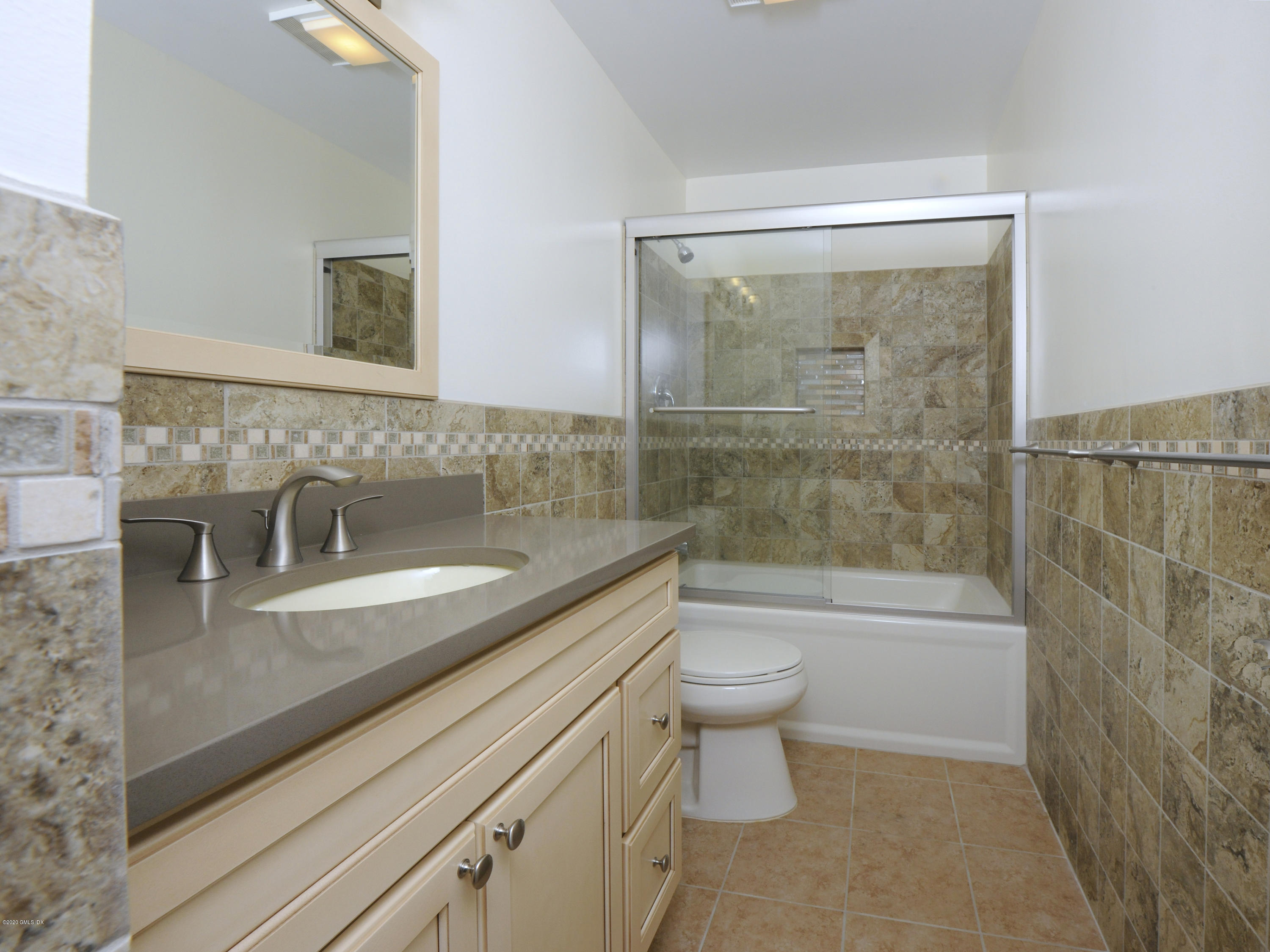 78 Silo Circle Riverside, CT 06878 - Photo 15 of 27 a bathroom with a sink a toilet and a bathtub