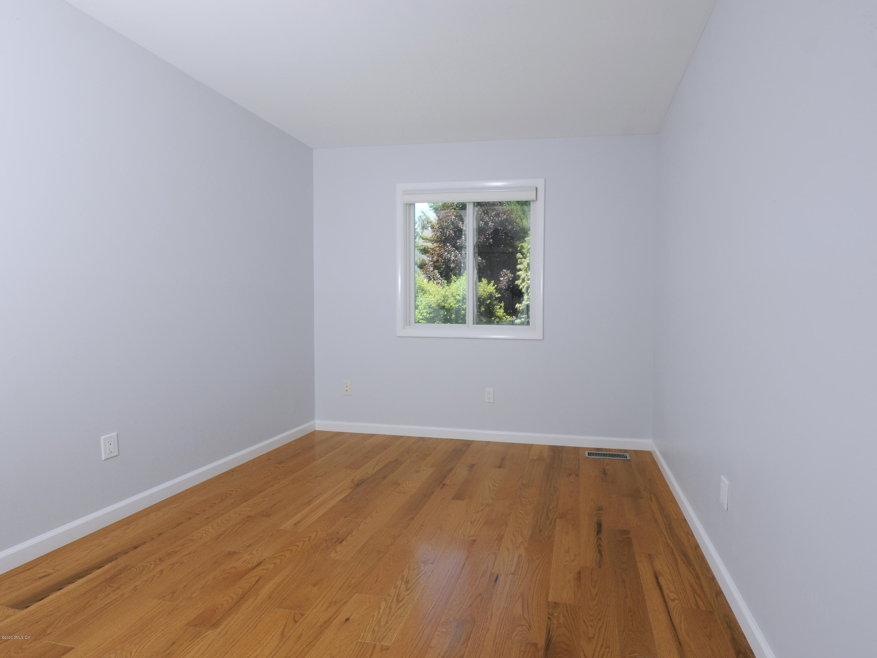 78 Silo Circle Riverside, CT 06878 - Photo 16 of 27 a view of room with window and hardwood floor