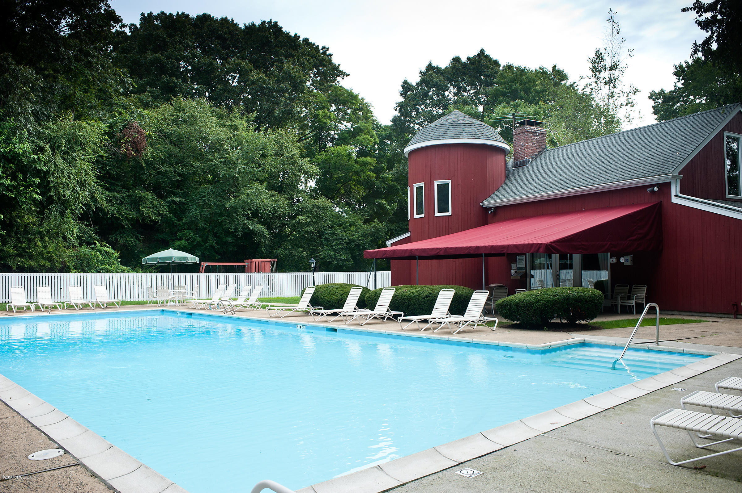 78 Silo Circle Riverside, CT 06878 - Photo 25 of 27 a view of a swimming pool with a patio
