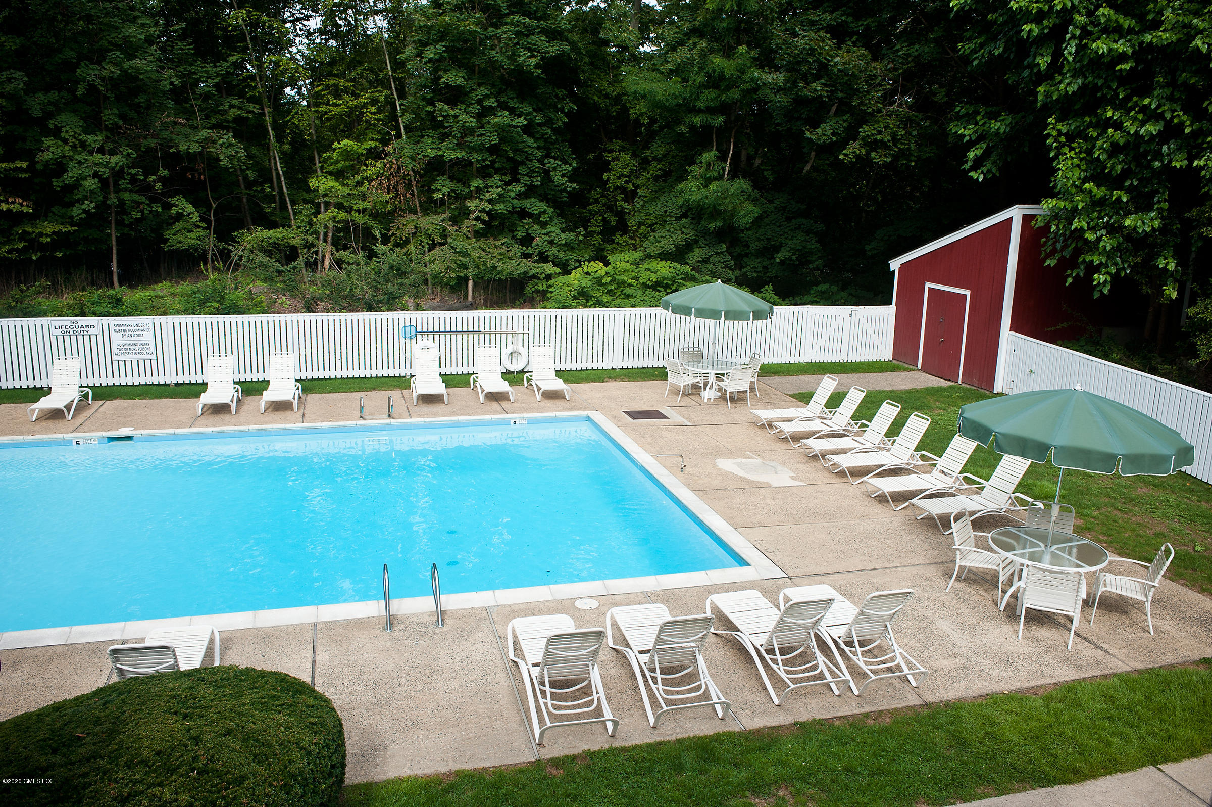 78 Silo Circle Riverside, CT 06878 - Photo 26 of 27 a view of a chairs and table in the patio