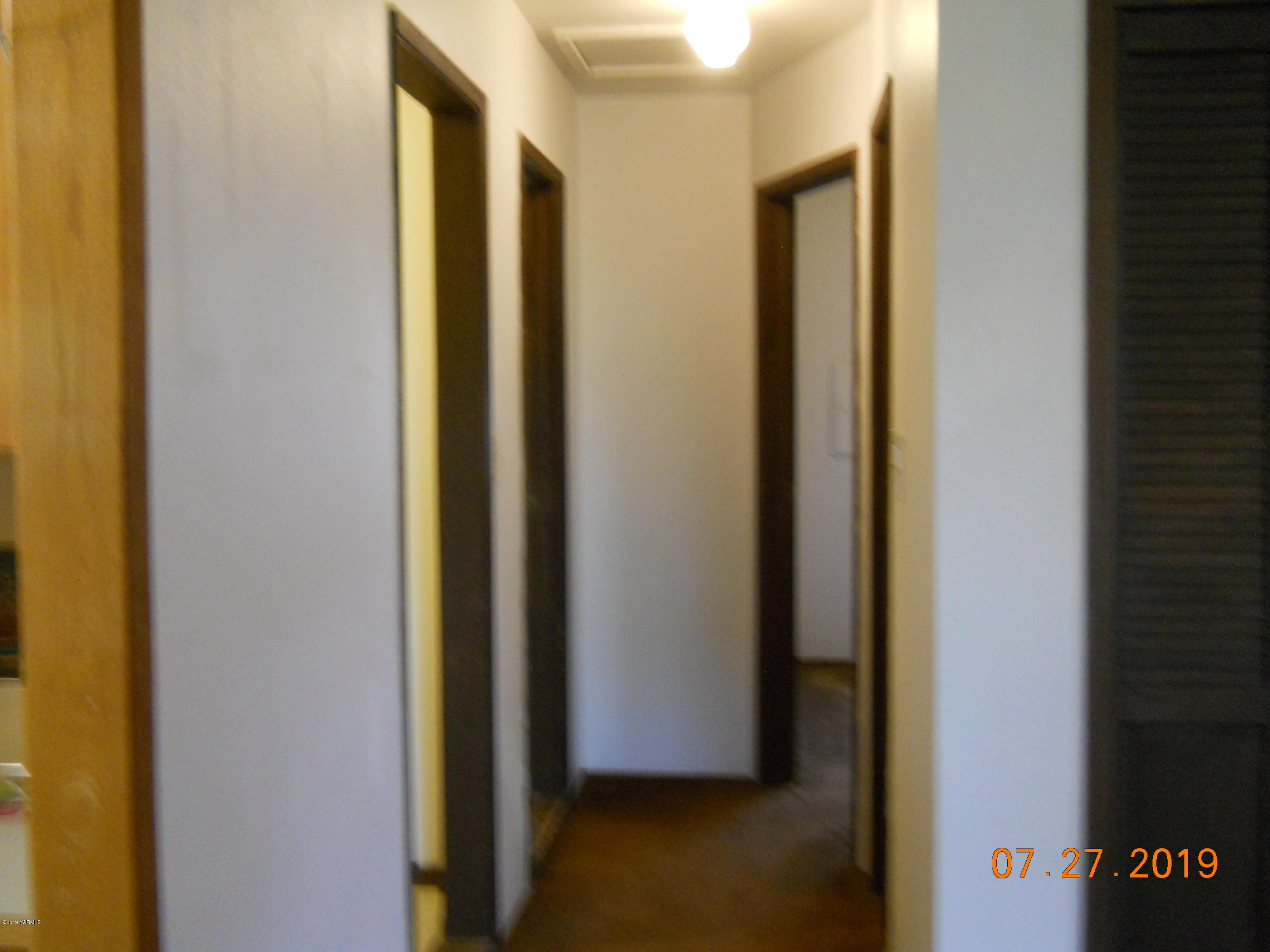 221 Rader Road Sunnyside, WA 98944 - Photo 8 of 13 a view of front door
