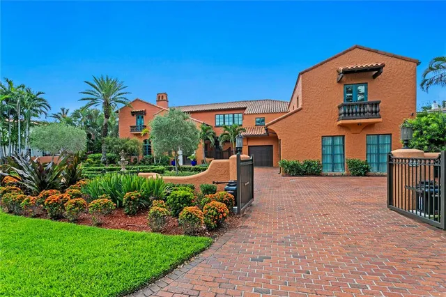 a view of a swimming pool with lounge chairs
