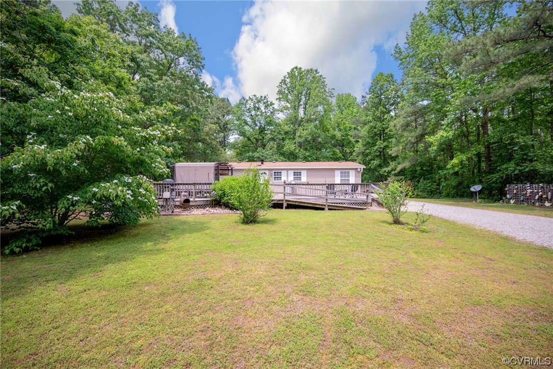 648 New Dragon Bridge Road Mascot, VA 23108 - Photo 28 of 43 a wooden fence with some trees in the background
