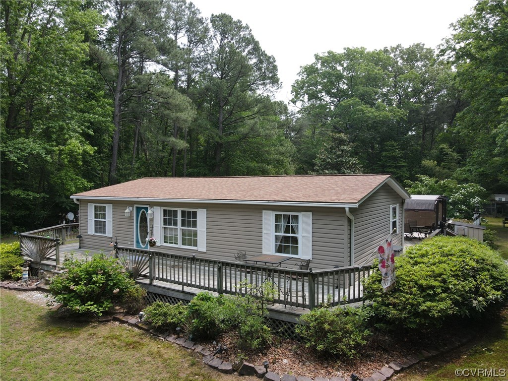 648 New Dragon Bridge Road Mascot, VA 23108 - Photo 35 of 43 a front view of a house with a garden