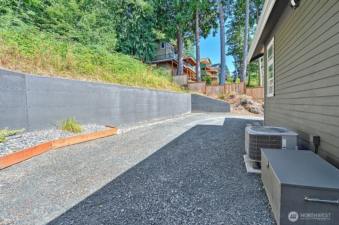 3042 North Shore Road Bellingham, WA 98226 - Photo 20 of 35 a view of a backyard with a sitting area