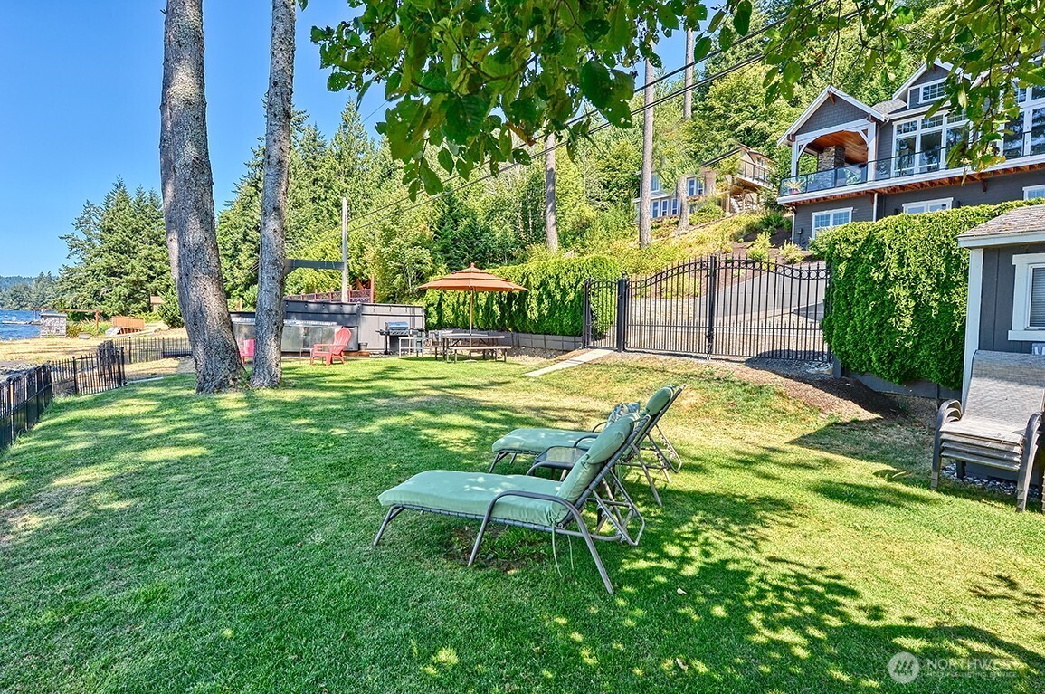 3042 North Shore Road Bellingham, WA 98226 - Photo 30 of 35 a swimming pool with outdoor seating and yard