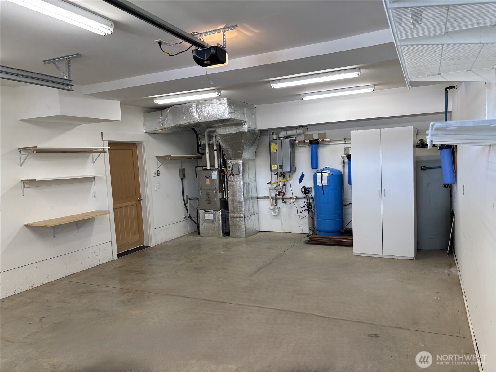 3042 North Shore Road Bellingham, WA 98226 - Photo 34 of 35 a view of a refrigerator and storage