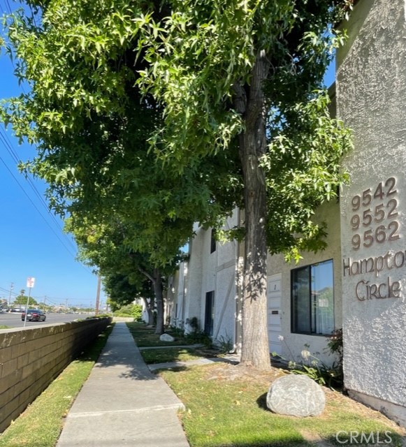 9542 Ball Road, Unit 4 Anaheim, CA 92804 - Photo 1 of 1 a front view of a house with garden