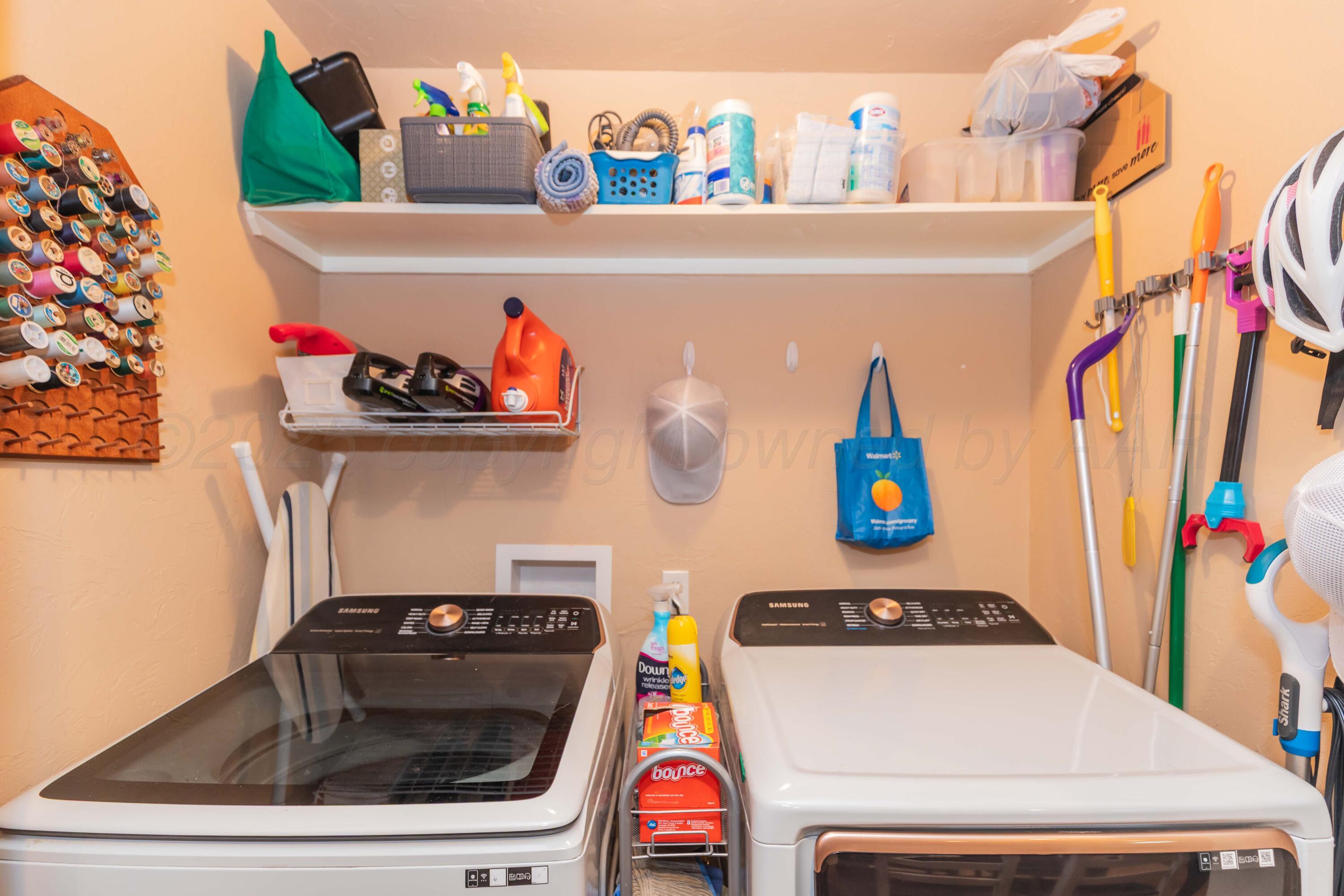 3609 Doris Drive Amarillo, TX 79109 - Photo 11 of 22 a utility room with dryer and washer