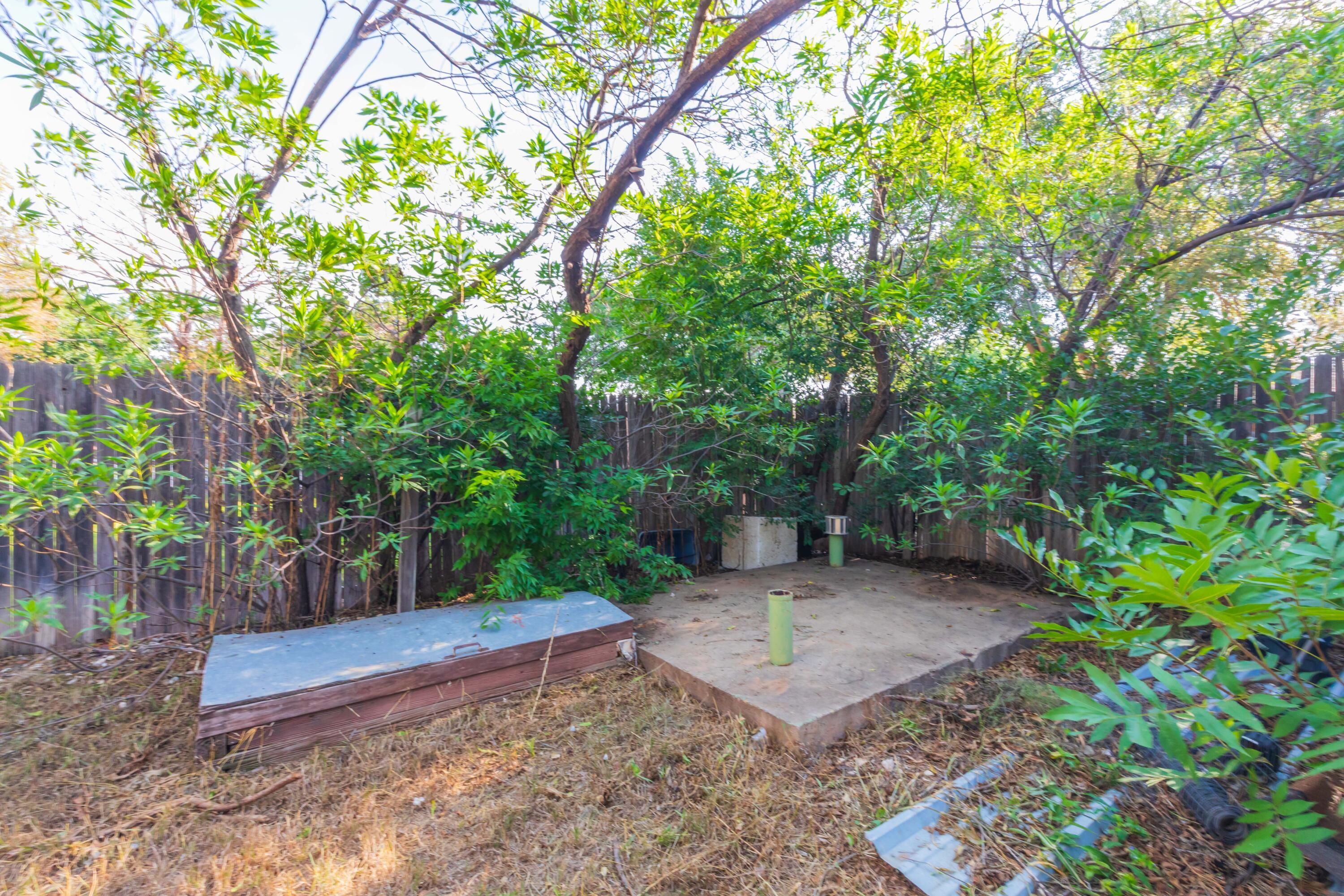 3609 Doris Drive Amarillo, TX 79109 - Photo 18 of 22 a view of a backyard with trees
