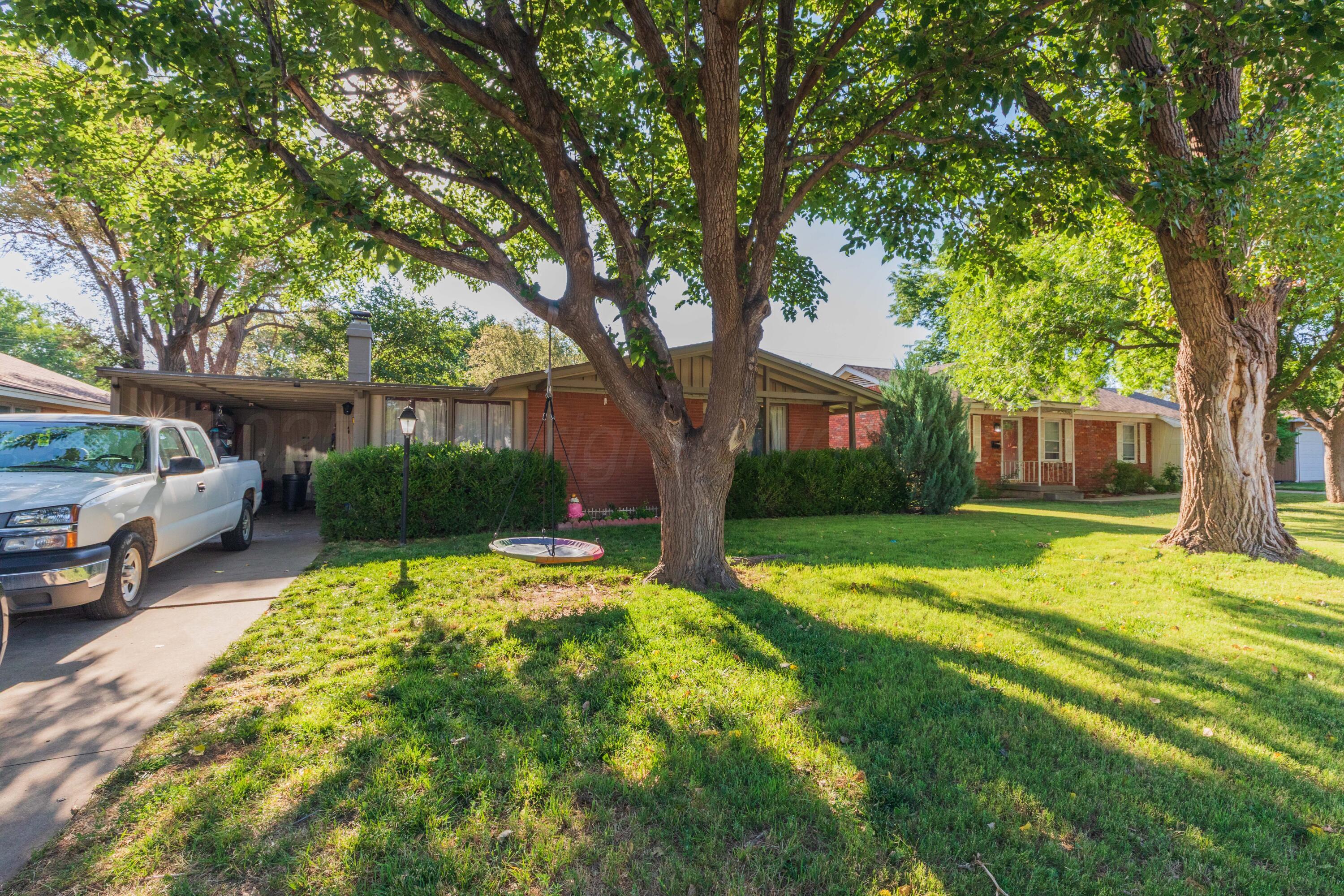 3609 Doris Drive Amarillo, TX 79109 - Photo 2 of 22 a view of a house with backyard and sitting area