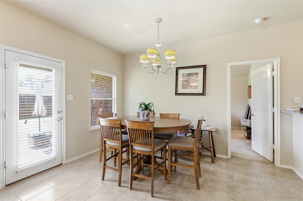 5491 Exeter Drive Prosper, TX 75078 - Photo 17 of 20 a view of a dining room with furniture and chandelier