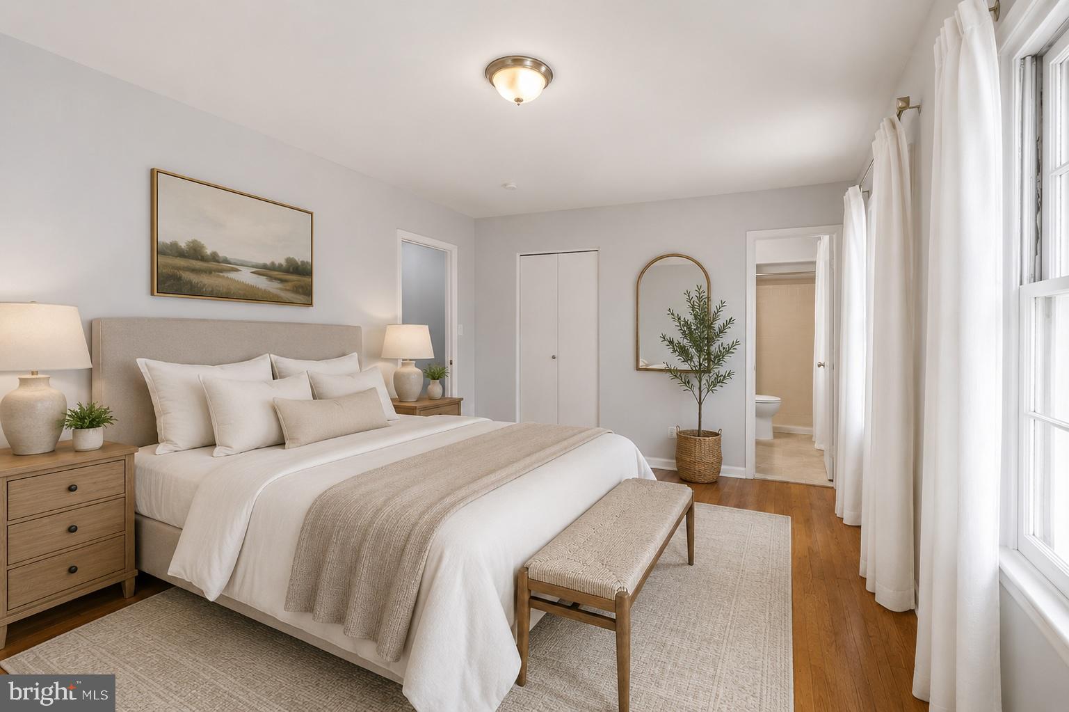 1201 Chillum Manor Road Hyattsville, MD 20783 - Photo 23 of 49 a bedroom with a bed and a painting on the wall