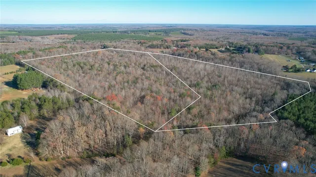 an aerial view of beach and ocean