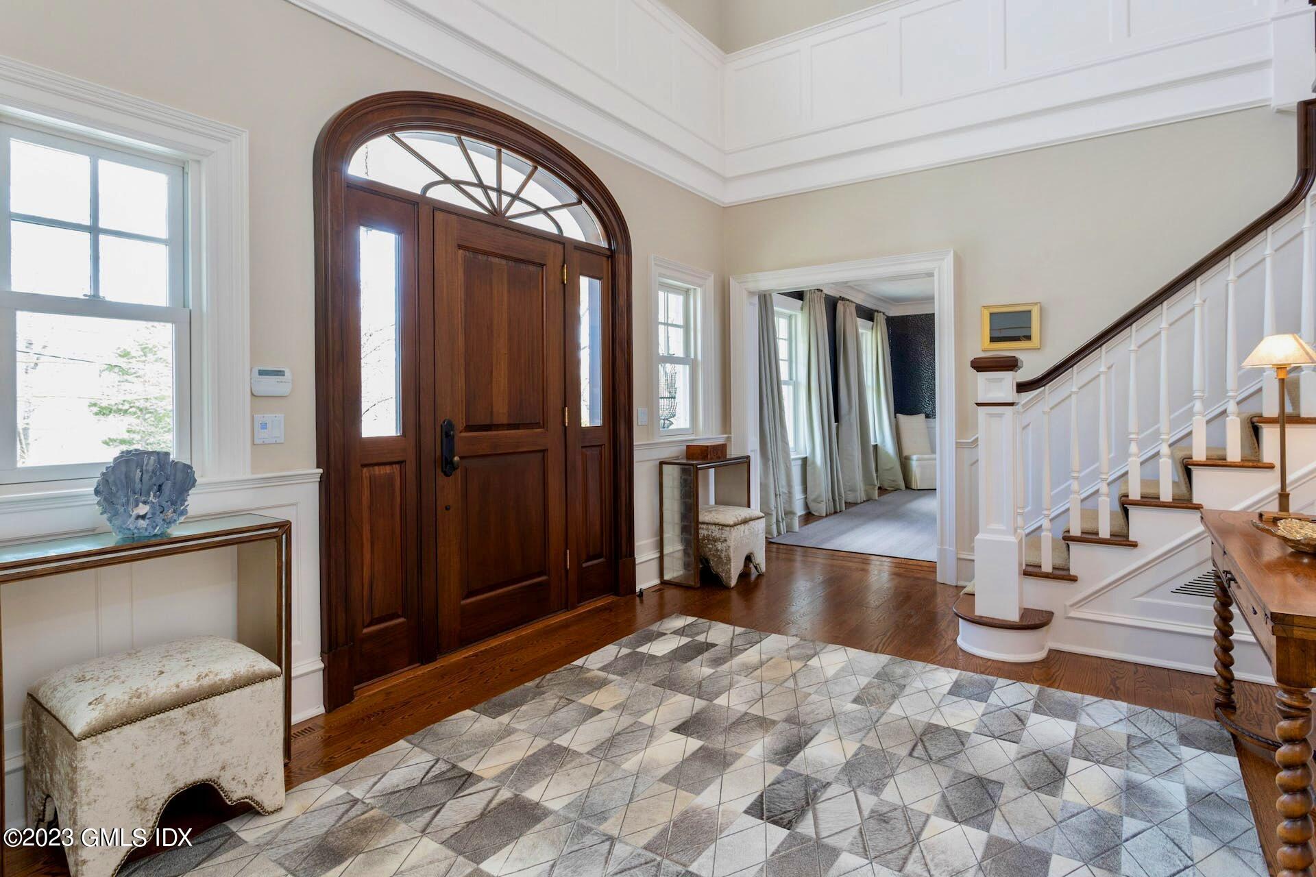 154 Cognewaugh Road Cos Cob, CT 06807 - Photo 3 of 46 a view of entryway and hall with a front door
