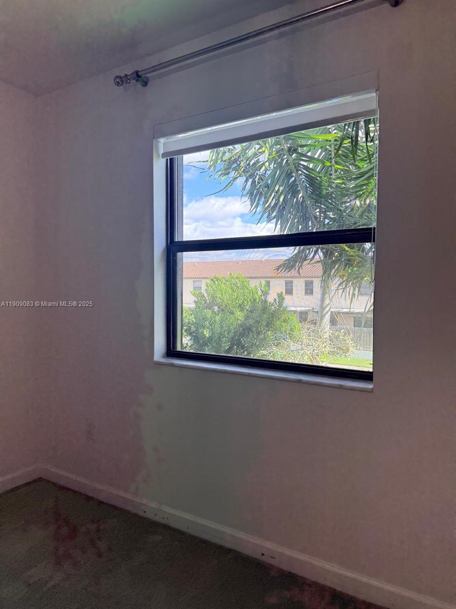 12715 Southwest 230th Terrace, Unit 1 Miami, FL 33170 - Photo 3 of 24 a view of a window in a room