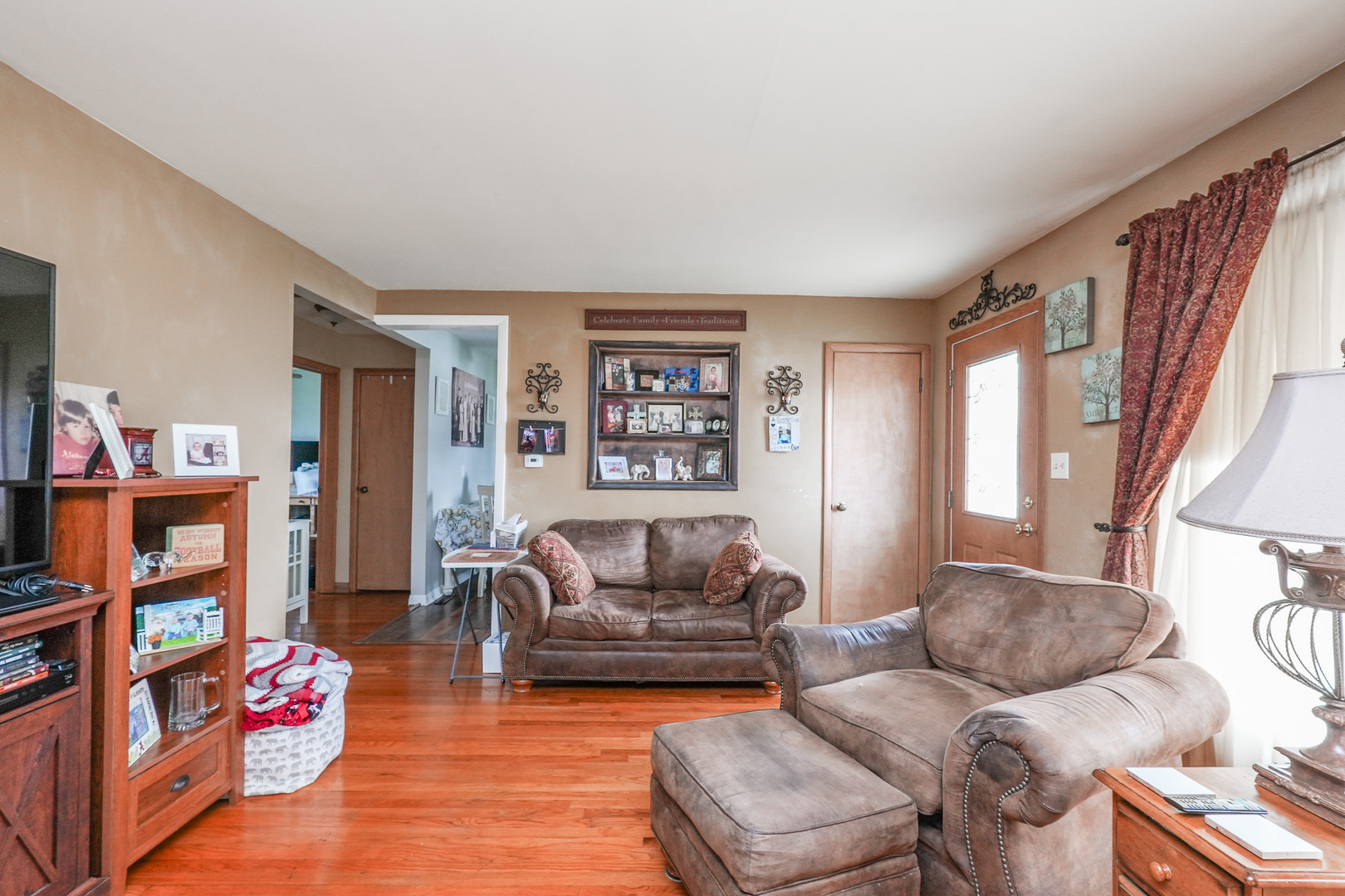304 Ashley Avenue Bourbonnais, IL 60914 - Photo 6 of 18 a living room with furniture and a window