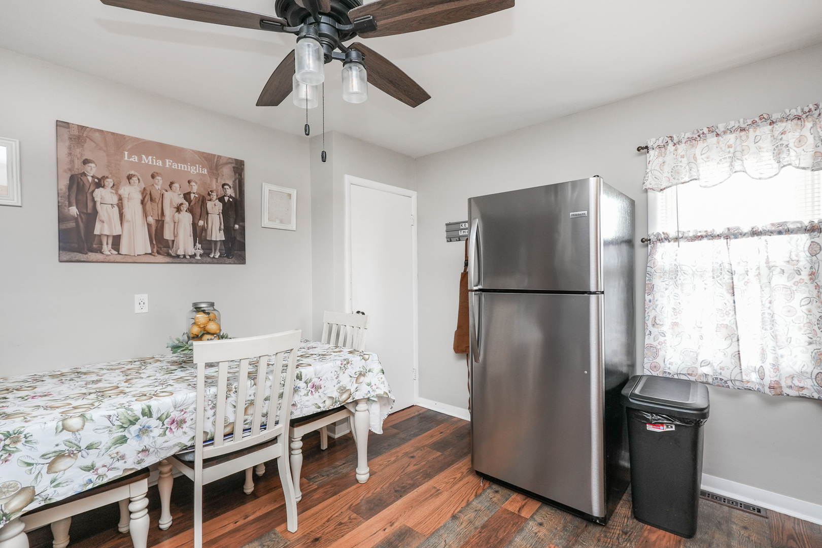 304 Ashley Avenue Bourbonnais, IL 60914 - Photo 10 of 18 a bed room with a bed and a chandelier