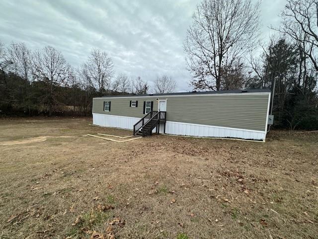381 Dixon Road Sparta, GA 31087 - Photo 2 of 13 a view of outdoor space with deck and yard