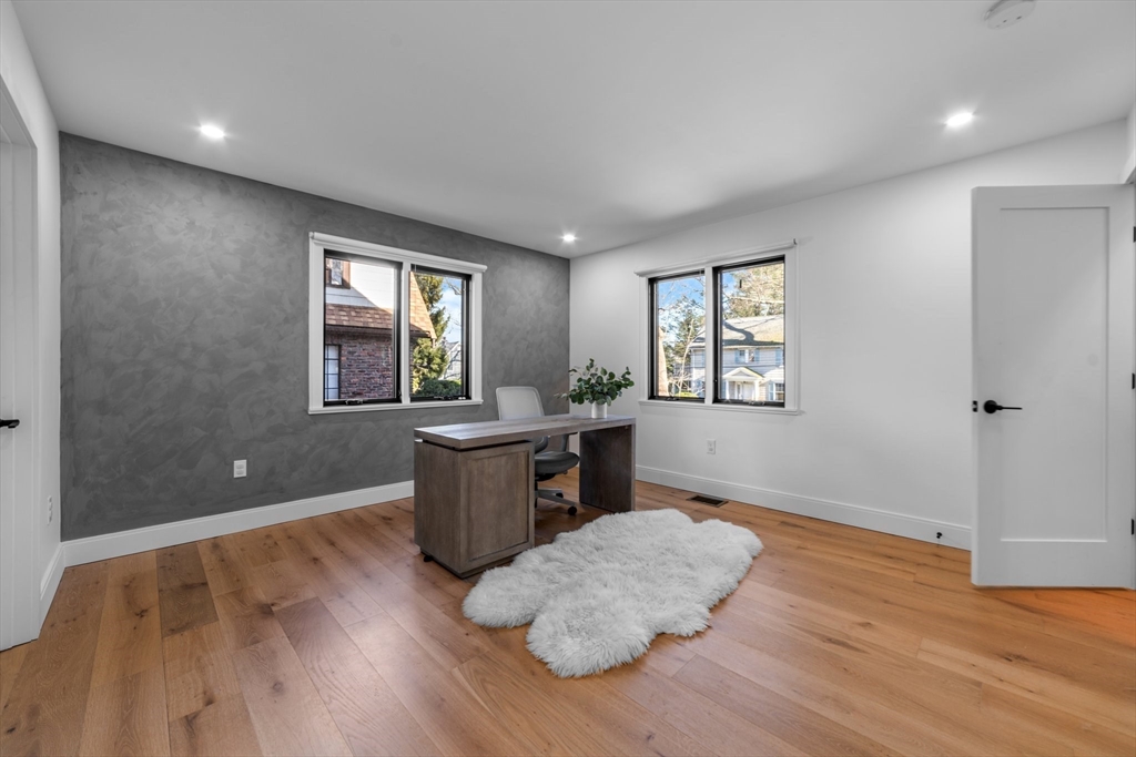 45 Rowena Road Newton, MA 02459 - Photo 27 of 42 a view of livingroom with window and wooden floor