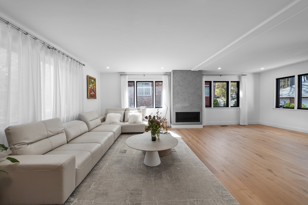 45 Rowena Road Newton, MA 02459 - Photo 41 of 42 a living room with furniture and wooden floor