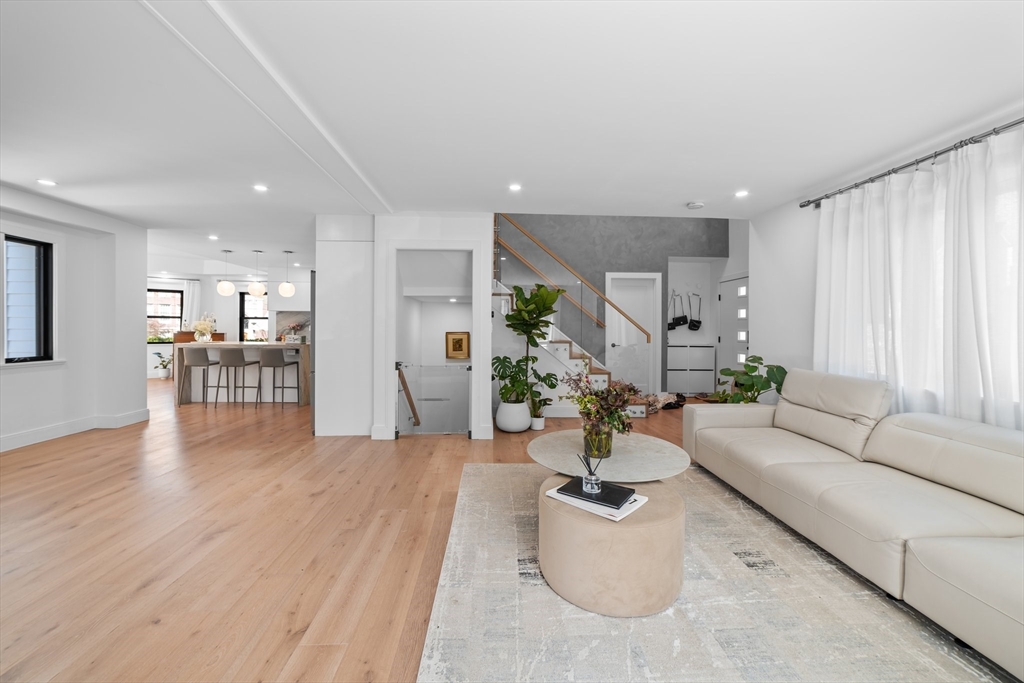 45 Rowena Road Newton, MA 02459 - Photo 42 of 42 a living room with furniture and wooden floor