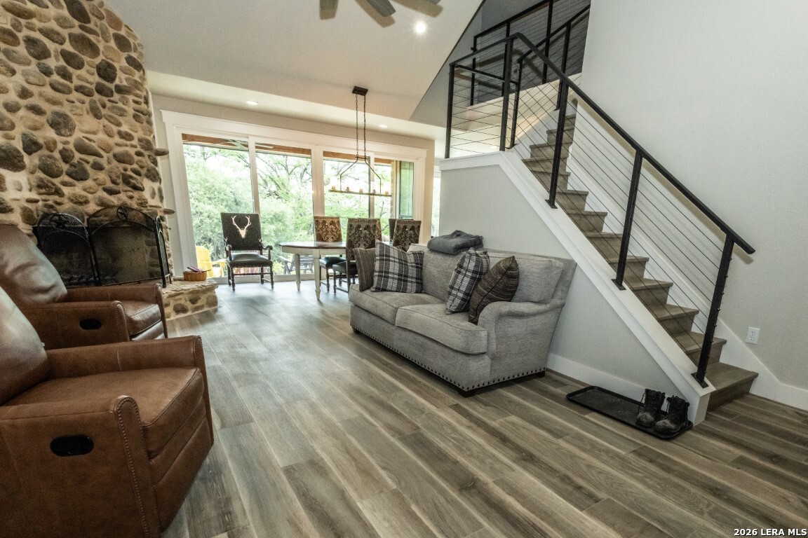 1040 Panther Hill Road Utopia, TX 78884 - Photo 11 of 49 a living room with furniture and a floor to ceiling window