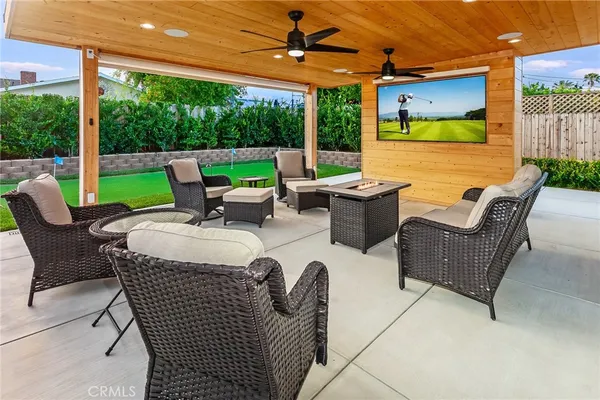 a view of a patio with couches chairs and a table