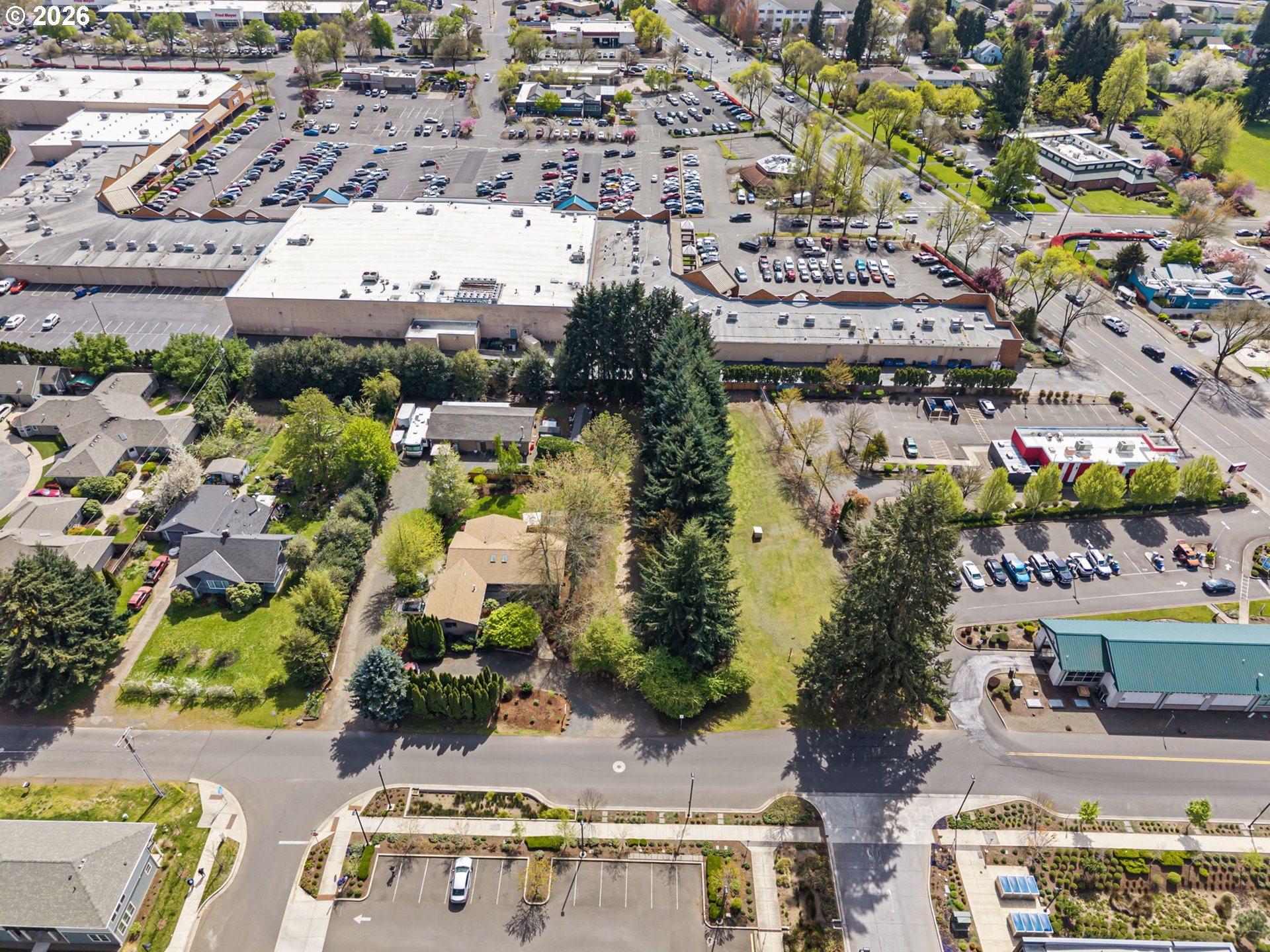 84 Green Lane Eugene, OR 97404 - Photo 40 of 41 an aerial view of residential houses with outdoor space