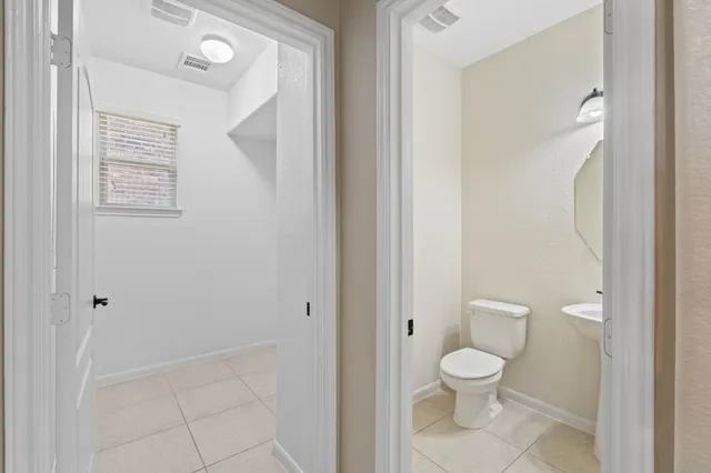 a small space with a window and a shower