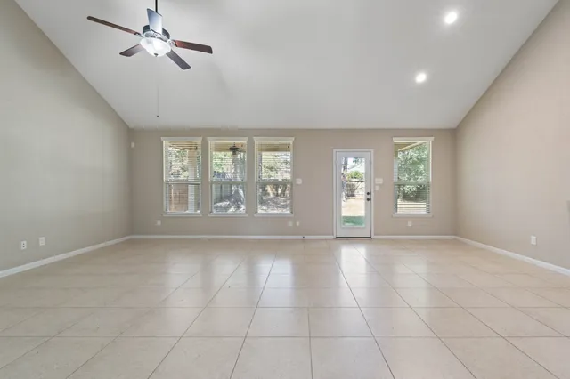 a view of a kitchen with a sink and dishwasher cabinets