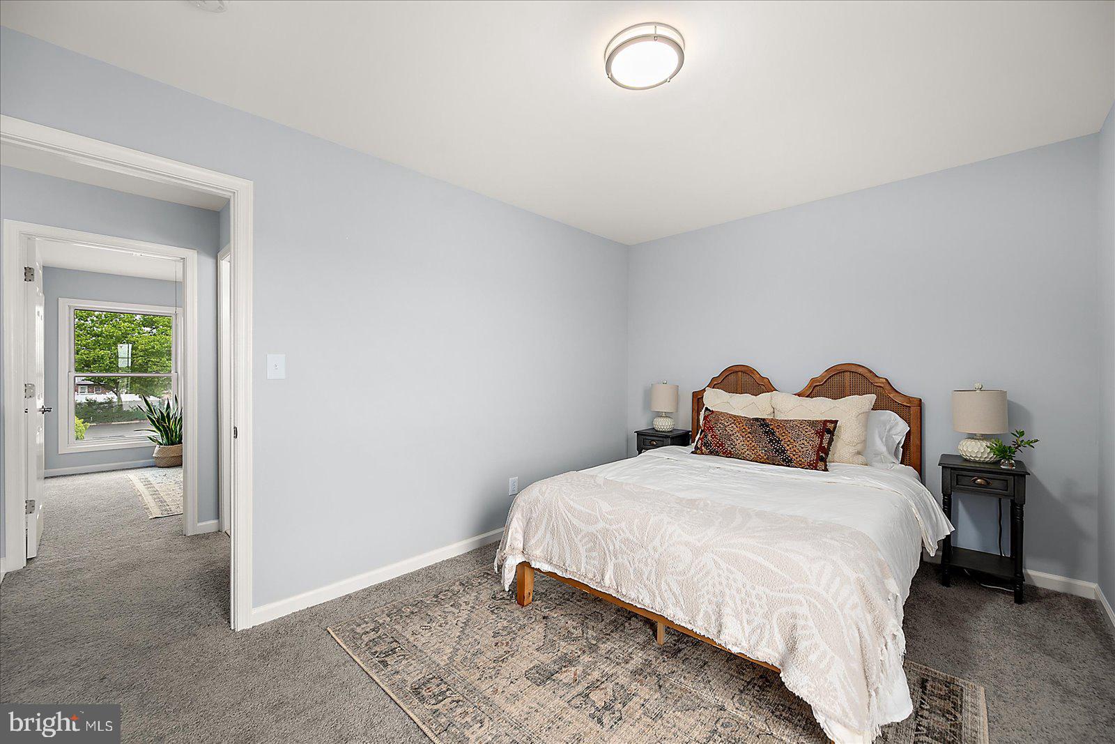 135 Jamestown Road, Unit 18A Ocean City, MD 21842 - Photo 29 of 63 a bedroom with a bed and a window
