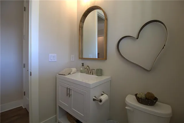 a view of a sink and washer dryer