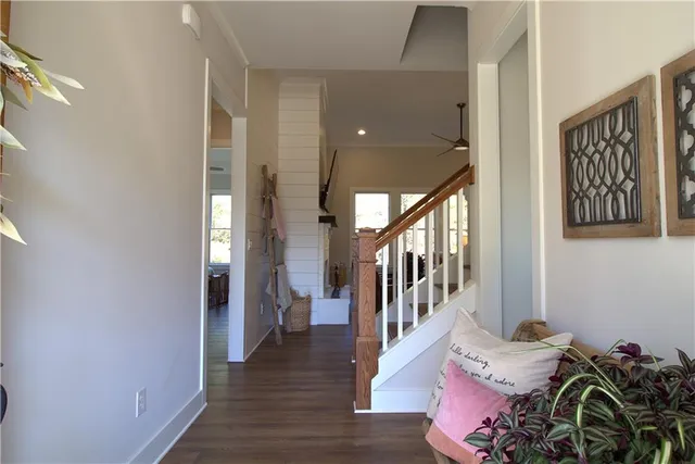 a view of entryway with wooden floor