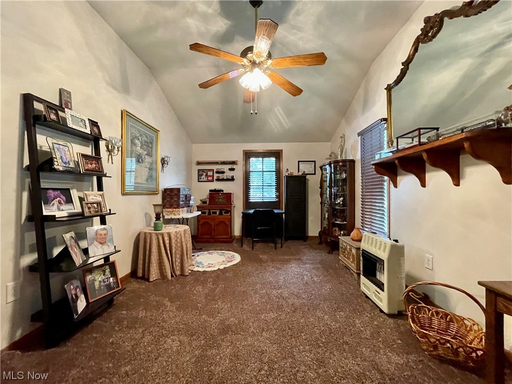 66119 Highway 124 Reedsville, OH 45772 - Photo 9 of 29 Office area with vaulted ceiling, dark carpet, and ceiling fan