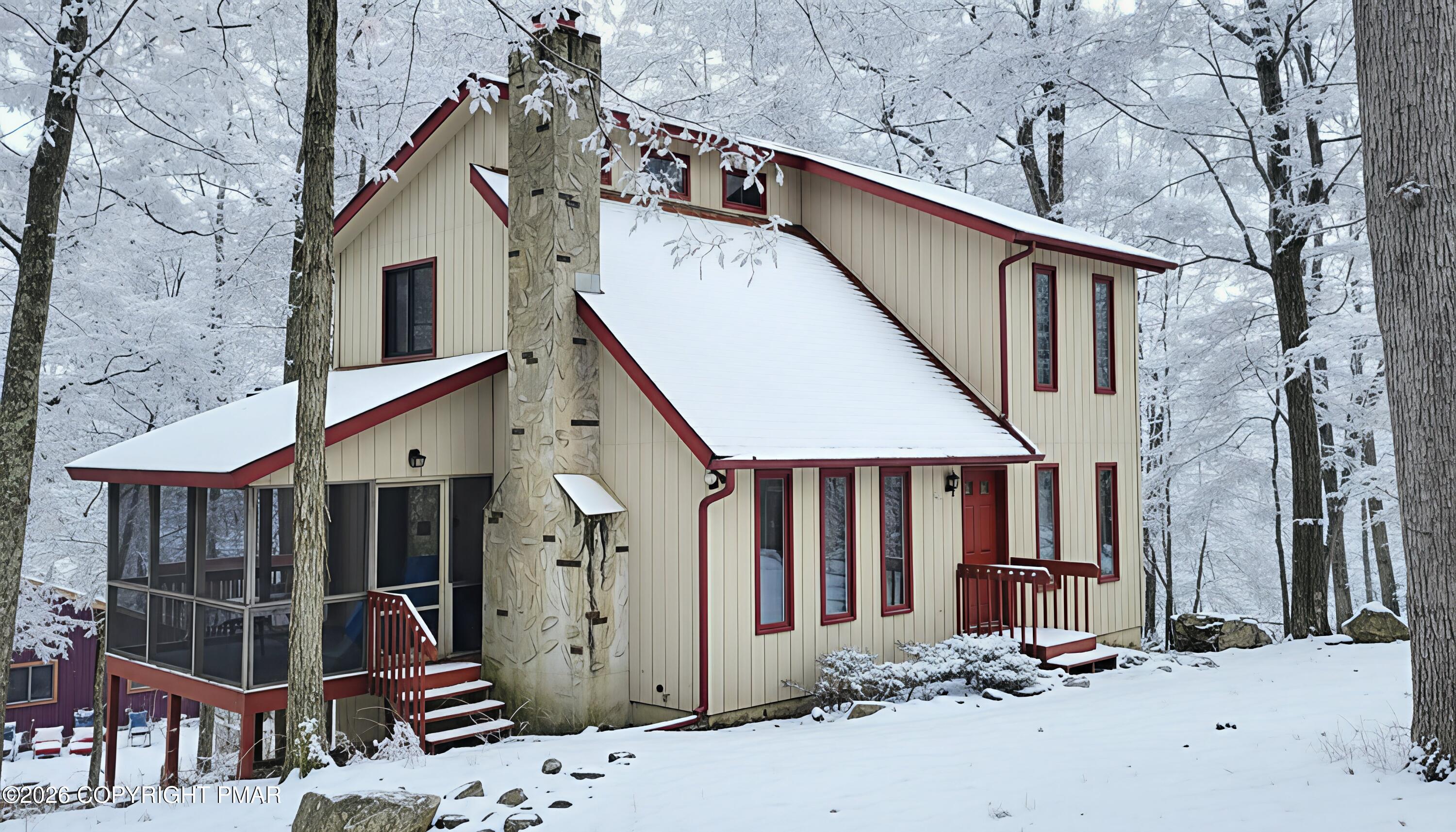 a front view of a house with parking space