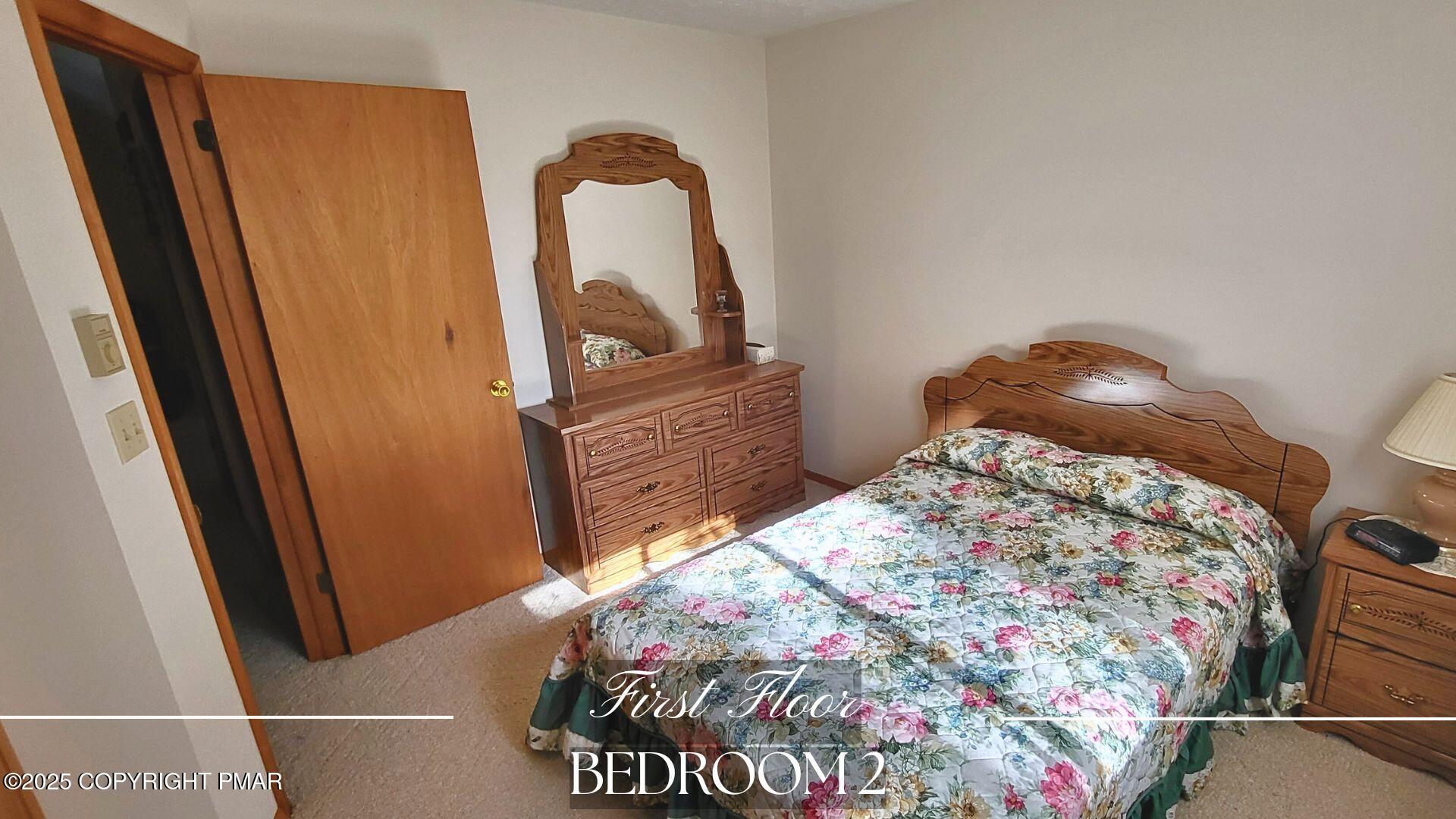 188 Radcliff Road Bushkill, PA 18324 - Photo 17 of 51 a bedroom with a bed and a dresser