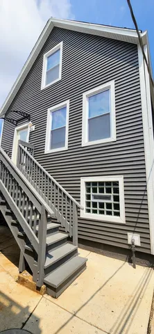 a view of a house with a balcony