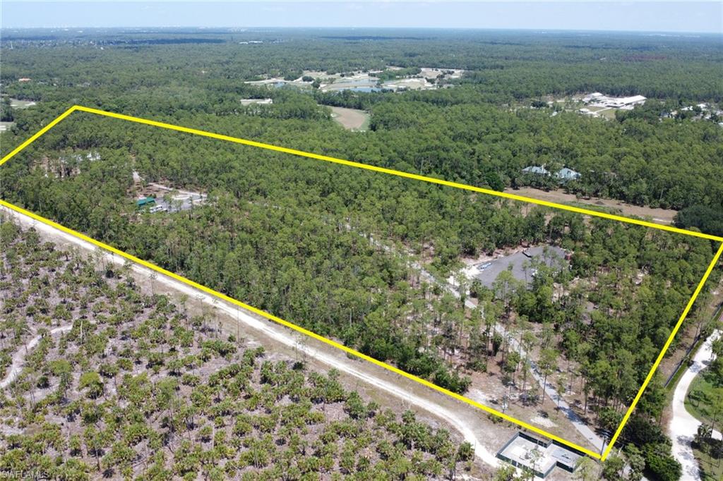 2825 Jenkins Way Naples, FL 34117 - Photo 43 of 50 a view of a lake from a balcony