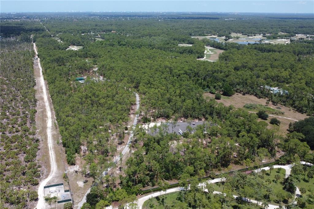 2825 Jenkins Way Naples, FL 34117 - Photo 44 of 50 an aerial view of multiple house