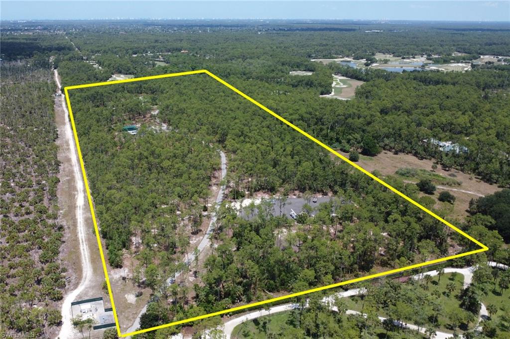 2825 Jenkins Way Naples, FL 34117 - Photo 45 of 50 an aerial view of mountain with a lake view