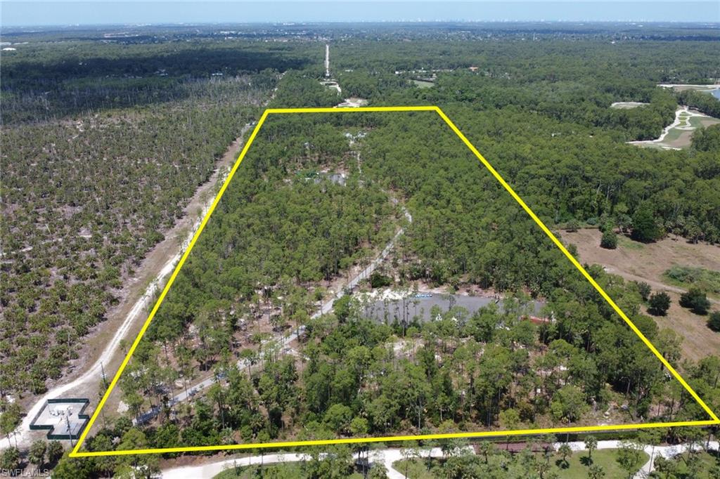 2825 Jenkins Way Naples, FL 34117 - Photo 47 of 50 a view of a backyard