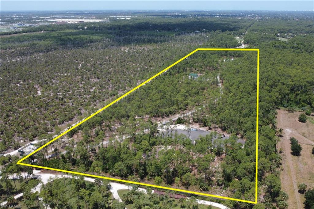 2825 Jenkins Way Naples, FL 34117 - Photo 49 of 50 a view of a balcony with an outdoor space