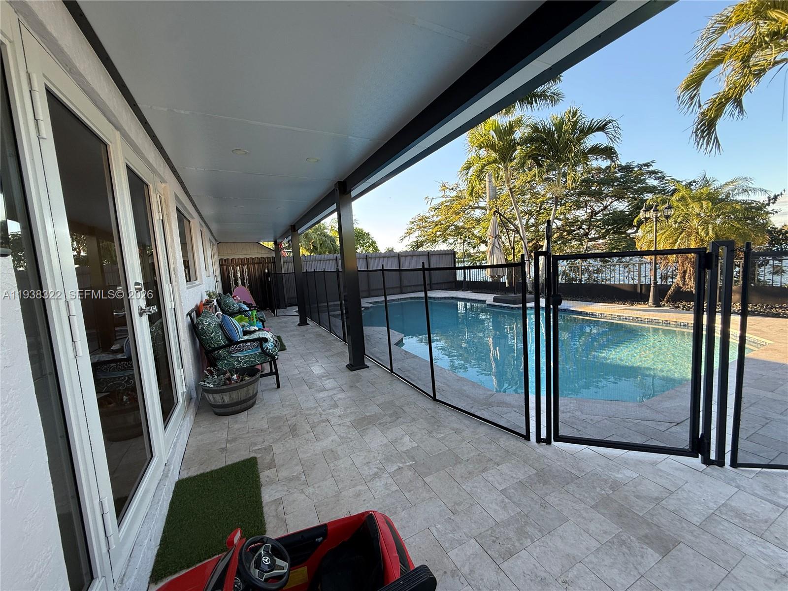 8335 Northwest 197th Terrace Hialeah, FL 33015 - Photo 18 of 51 a view of a porch