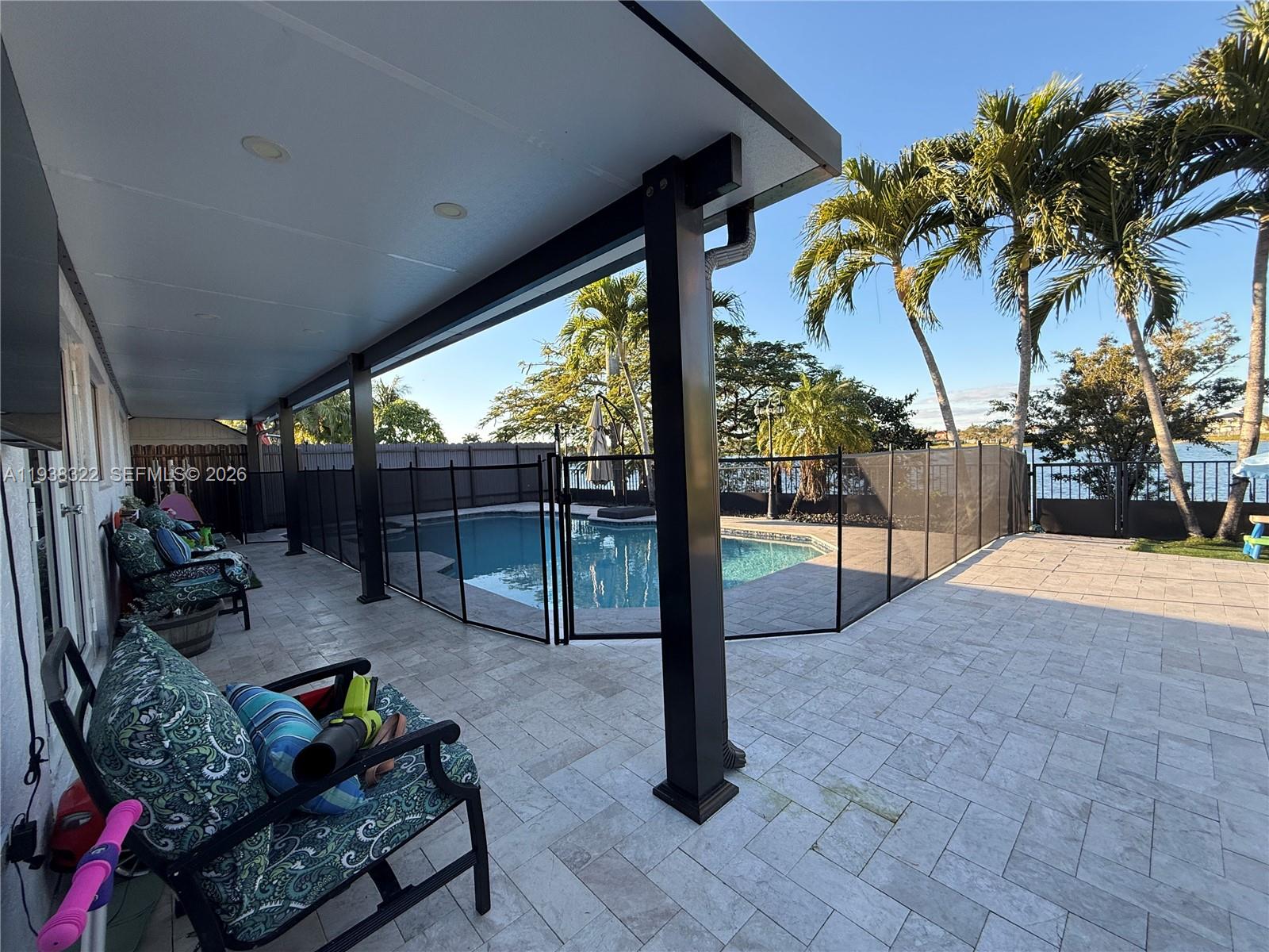 8335 Northwest 197th Terrace Hialeah, FL 33015 - Photo 19 of 51 a building outdoor space with seating space