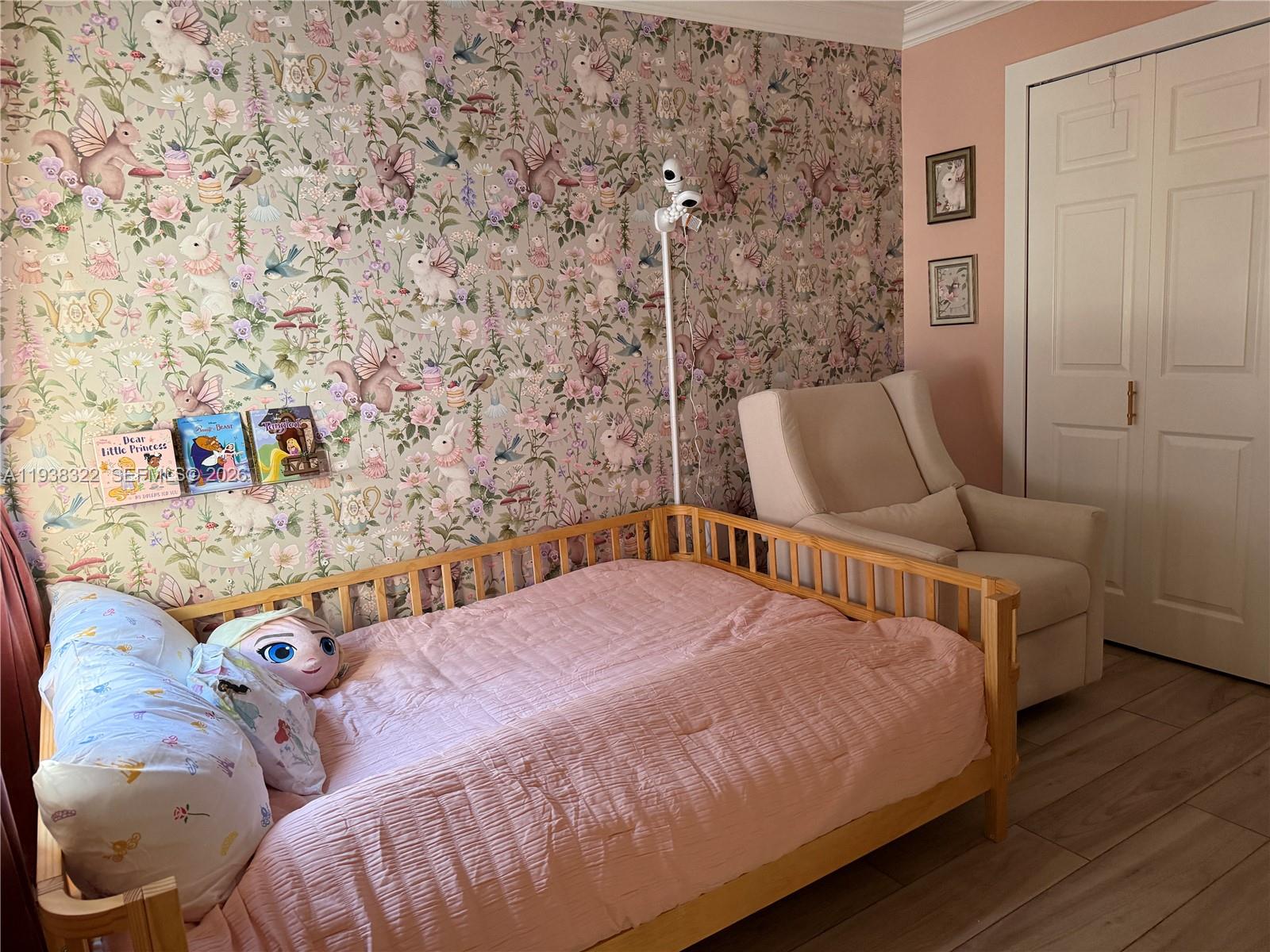 8335 Northwest 197th Terrace Hialeah, FL 33015 - Photo 38 of 51 a bedroom with a bed and wooden floor