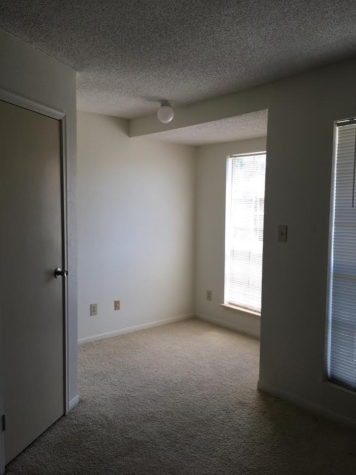 7575 Cambridge Street, Unit 1004 Houston, TX 77054 - Photo 15 of 23 a view of an empty room and a window