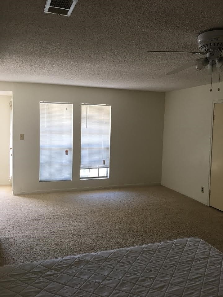 7575 Cambridge Street, Unit 1004 Houston, TX 77054 - Photo 17 of 23 a view of an empty room with a window