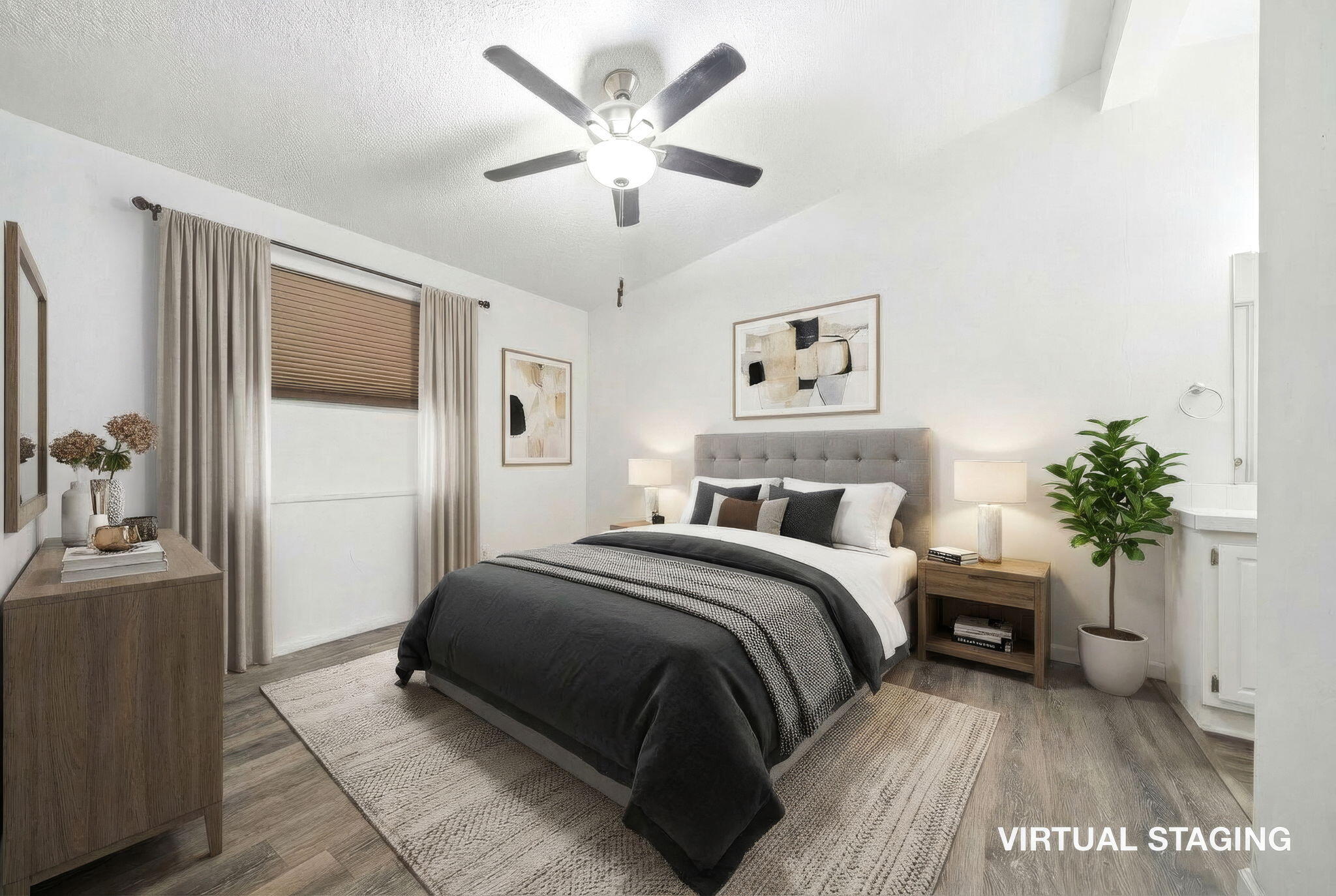 11705 Parey Avenue, Unit 7 Red Bluff, CA 96080 - Photo 18 of 34 a spacious bedroom with a bed and a potted plant