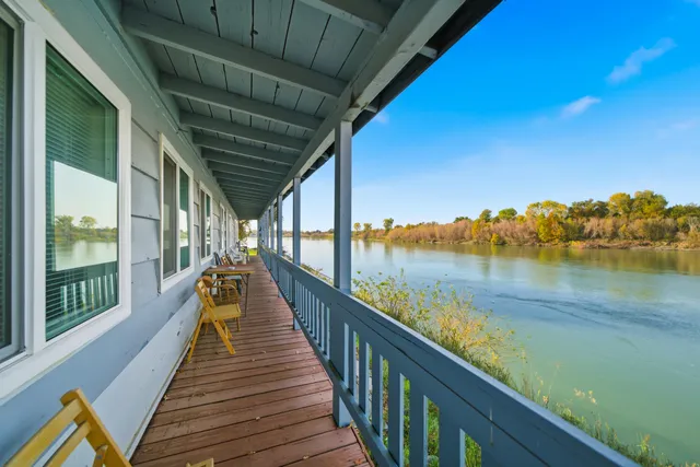 a view of lake with green space